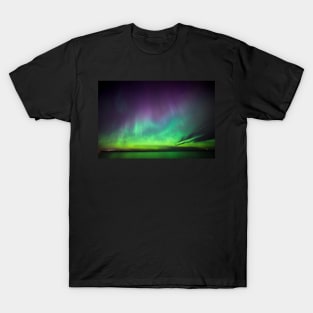 Beautiful northern lights over lake in Finland T-Shirt